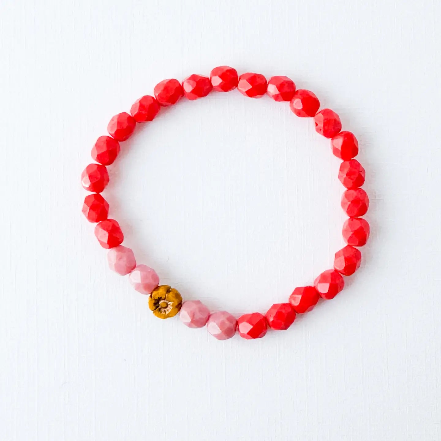 BEADED BRACELET WITH MUSTARD FLOWER