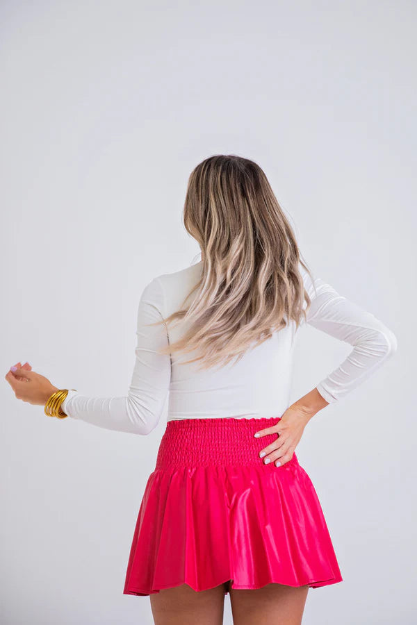 PLEATHER SMOCK SKORT - HOT PINK