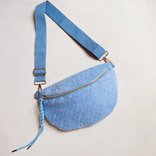 DAISY EMBOSSED BELT SLING BAG