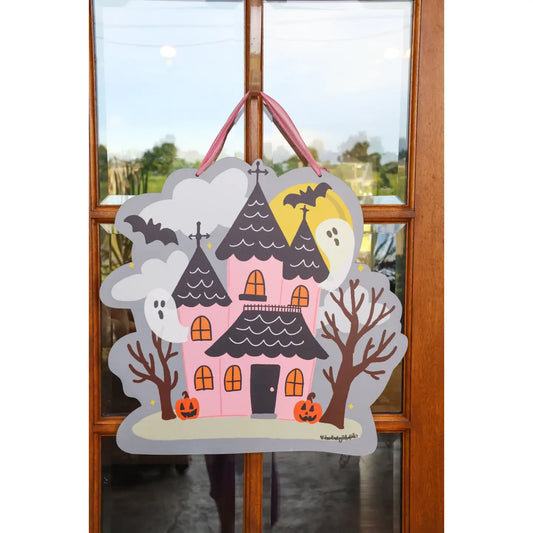 PINK HAUNTED HOUSE W/ GHOSTS DOORHANGER